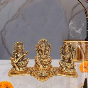 Alternative view of Amazon Brand - Umi Metal Ganesha Lakshmi and Saraswati Idol Metal Sculpture Seated On Peacock Throne Golden Height 4.0 Inches Width 7.5 Inches Medium